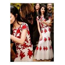 STUNNING WHITE SEMI STITCHED GOWN MODELED BY RUMENA BEGUM